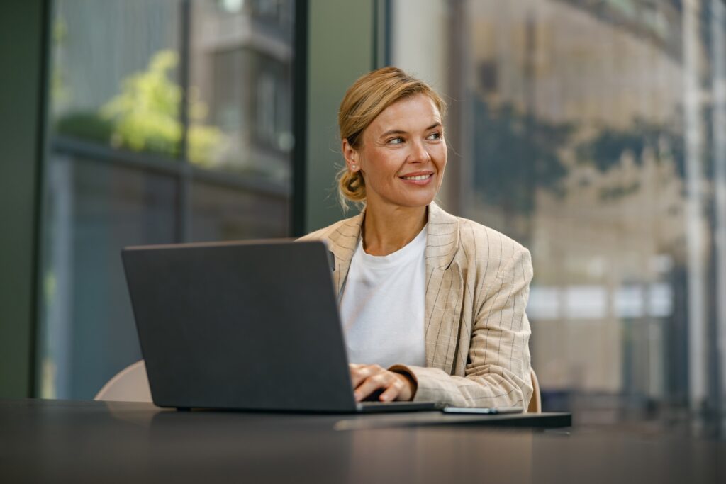 stylish business woman working on laptop sitting o 2024 10 18 08 11 15 utc