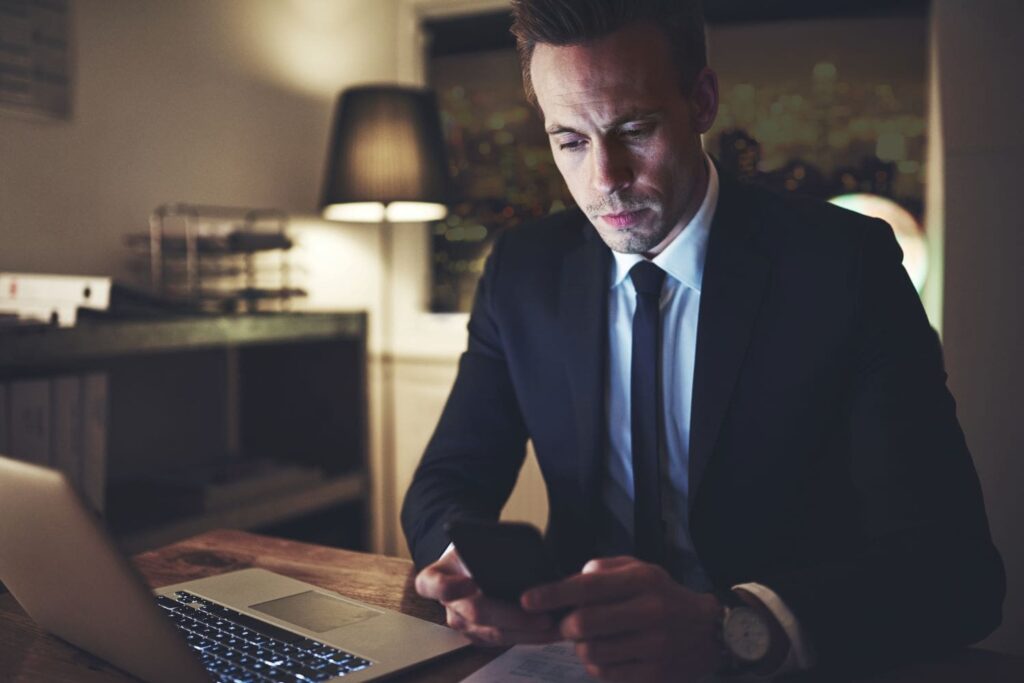 the lawyer browsing his phone in office 2021 08 27 09 59 21 utc min